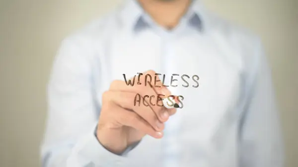 Wireless Access, man writing on transparent screen — Stock Photo, Image