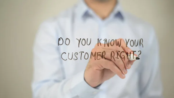Do You Know Your Customer Right ? man writing on transparent screen