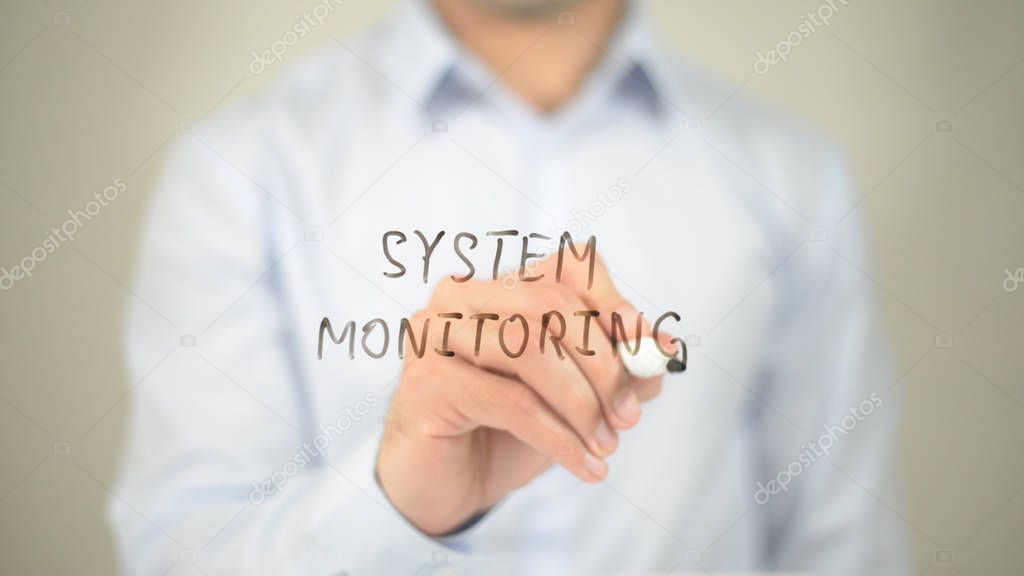 System Monitoring , man writing on transparent screen