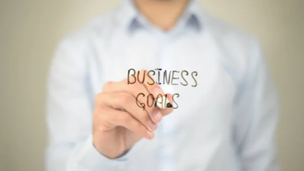 Business Goals,  Man writing on transparent screen — Stock Photo, Image