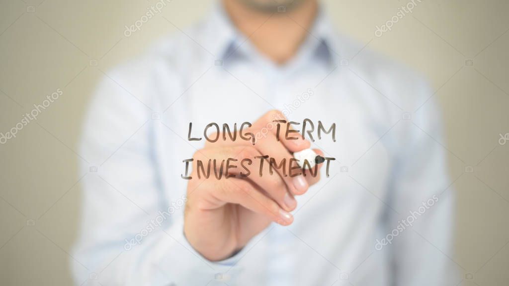 Long Term Investment,  Man writing on transparent screen
