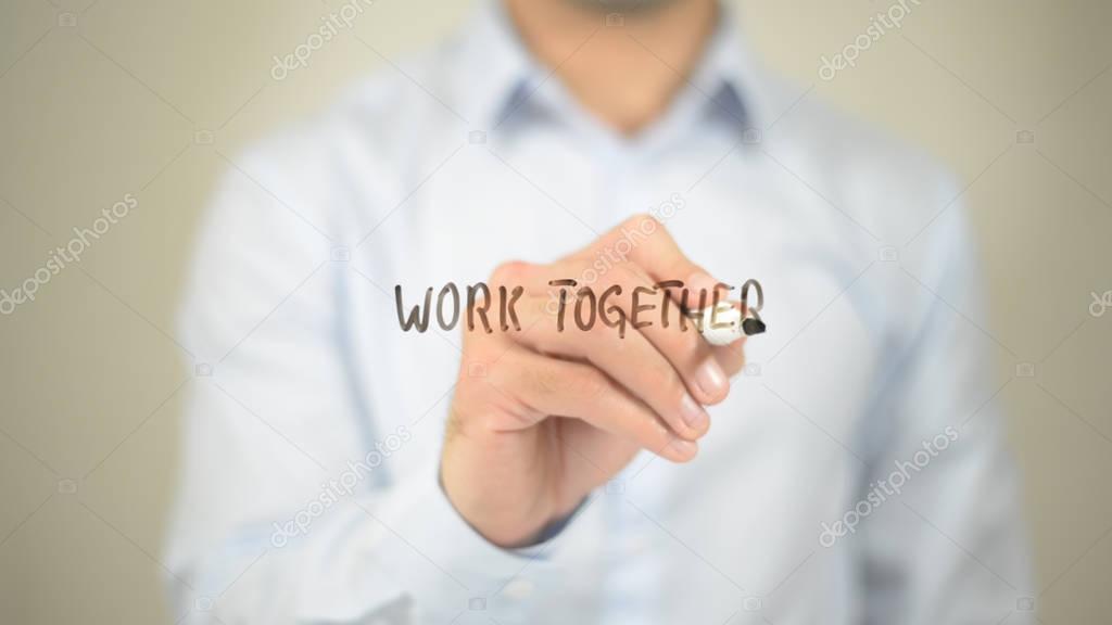 Work Together,  Man writing on transparent screen