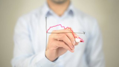 Borsa grafik kavramı, şeffaf ekranda yazma adam