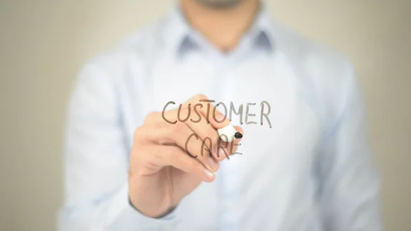 Customer Care,  Man writing on transparent screen — Stock Photo, Image
