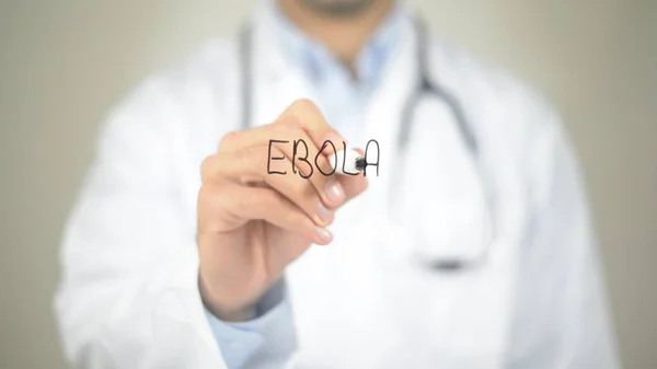 Ébola, Doctor escribiendo en pantalla transparente —  Fotos de Stock