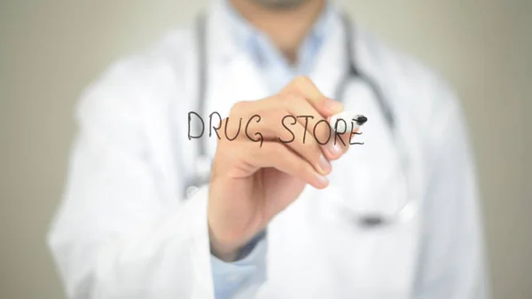Drug Store, Doctor writing on transparent screen — Stock Photo, Image