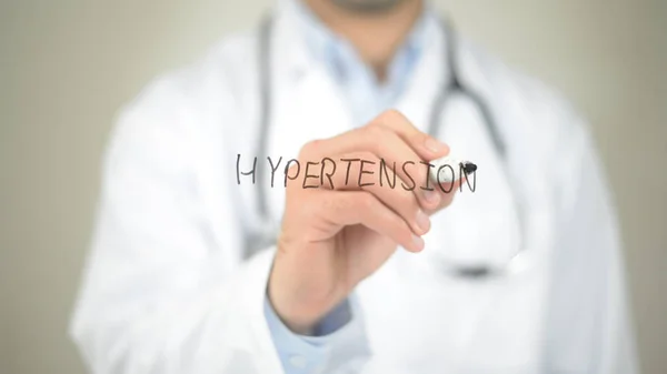 Hypertension, Doctor writing on transparent screen