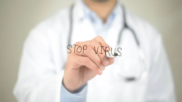 Stoppa Virus, läkare skriva på transparent skärm — Stockfoto