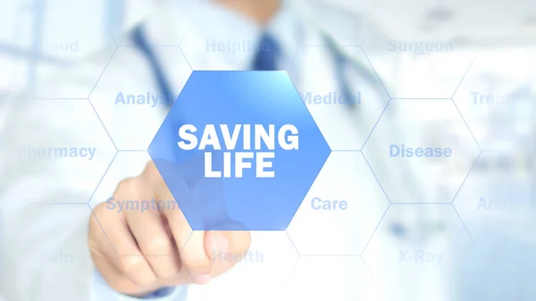 Saving Life, Doctor работает над графическим интерфейсом, Motion Graphics — стоковое фото