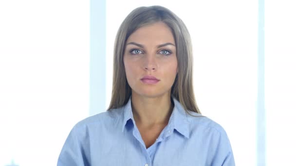 Beautiful Woman Sitting in Office, Looking at Camera — Stock Video