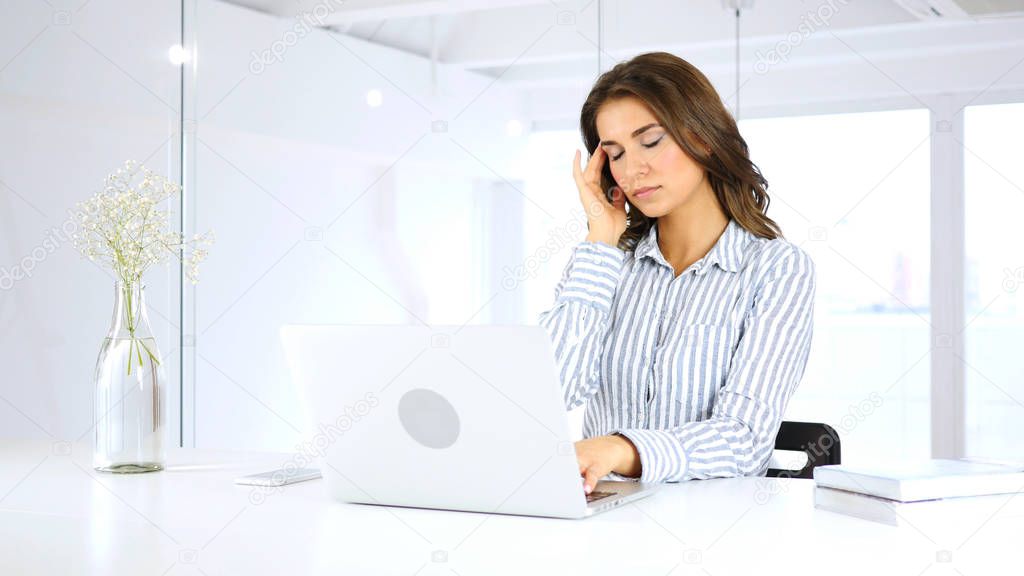 Tense Woman at Work in Stress, Headache