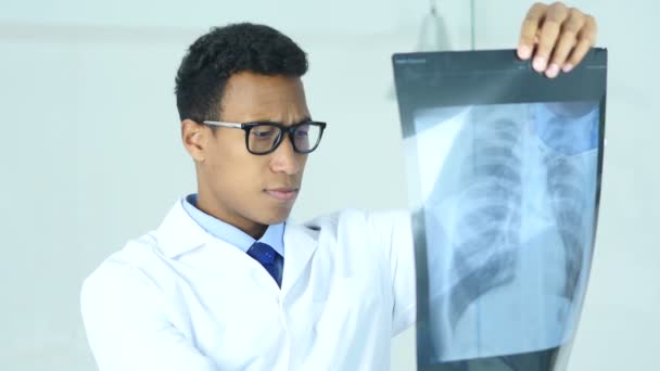 Serious Doctor Examing X-ray of Patient, Lungs and ribcage — Stock Video