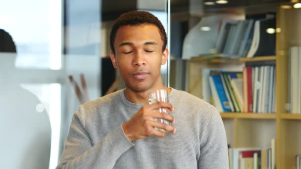 Portrait of Young Afro-American Man Drinking Water from Glass — Stock Video