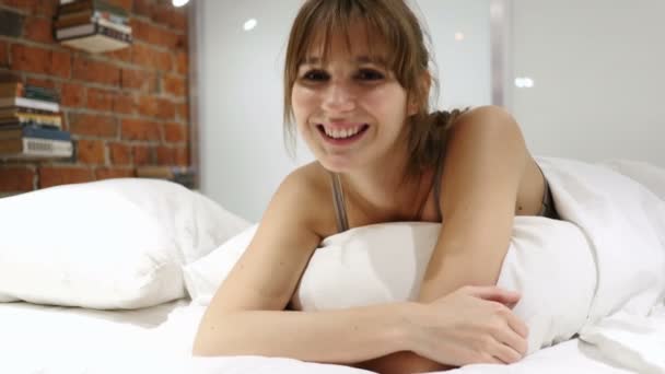 Yes by Young Woman Lying in Bed, Shaking Head to Agree — Stock Video