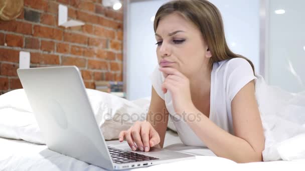 Thinking Pensive Woman in Bed Working on Laptop at Night — Stock Video