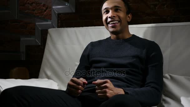 African Man Watching Match on TV and Celebrating Team Success — Stock Video