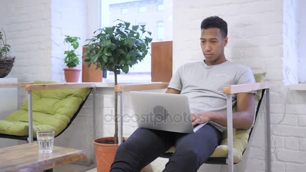 Serious Web Chat by African Designer at Work — Stock Video