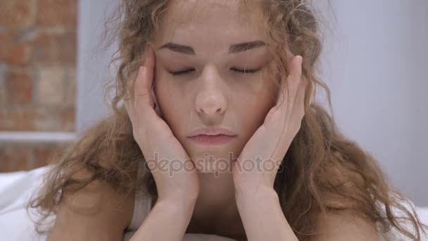 Beautiful Young Female with Stress and Headache Lying in Bed — Stock Video