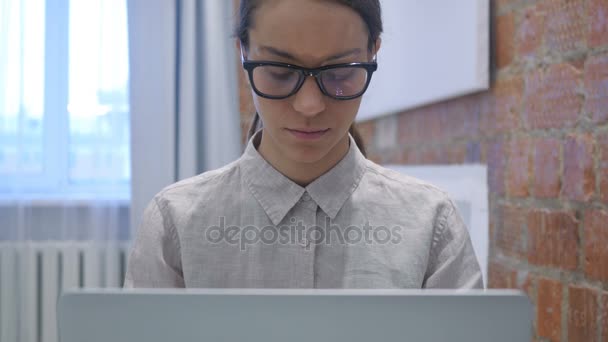 Stressed Hispanic Woman with Headache Working on Laptop — Stock Video