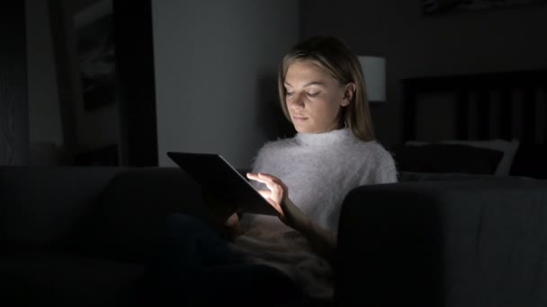 Woman Reacting to Success while Using Tablet at Night — Stock Video