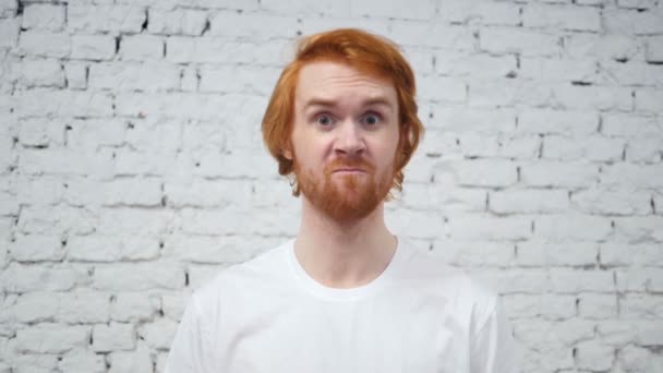 Slow Motion of Middle Finger de Redhead Designer Man in Office — Vídeos de Stock