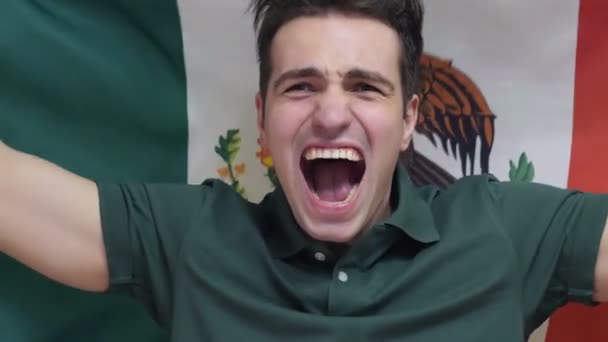 Mexican Young Man celebrates holding the flag of Mexico in Slow Motion — Stock Video