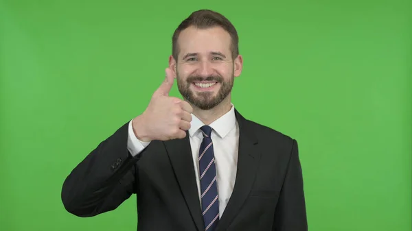 The Young Businessman Showing Thumbs Up against Chroma Key — Stock Photo, Image