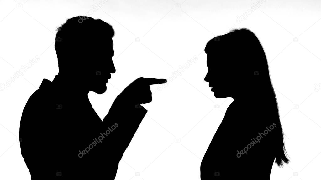 The Silhouette of Man Pointing on Woman against White Background