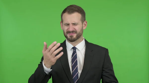 The Ambitious Businessman getting Upset against Chroma Key — Stock Photo, Image