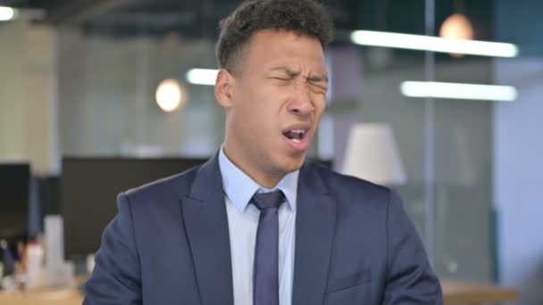 Portrait of Sleepy Young Businessman Yawning in Office — Stock Video