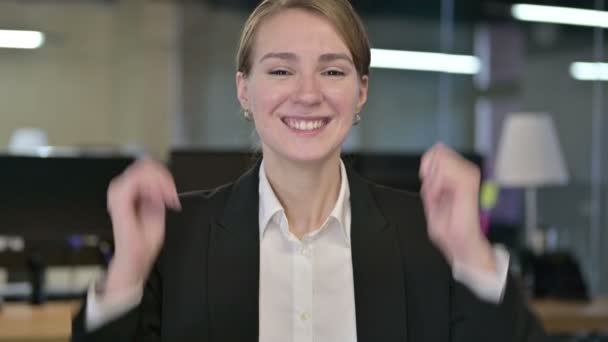 Portrait of Excited Young Businesswoman Celebrating Success — Stock Video