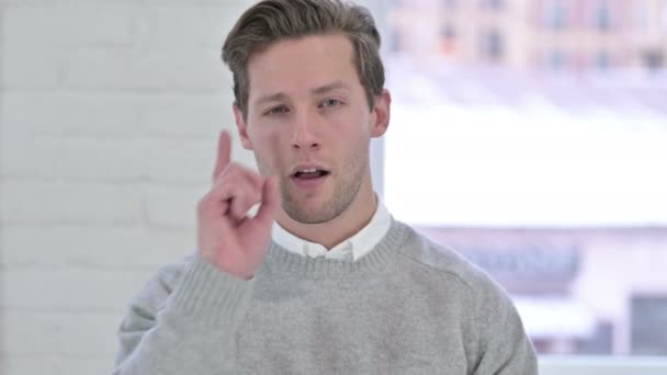 Portrait of Cheerful Young Man Pointing at the Camera — Stock Video