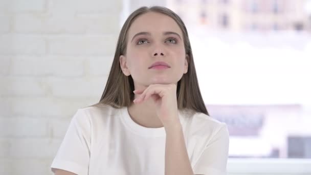 Portrait of Thoughtful Young Woman Thinking — Stock Video