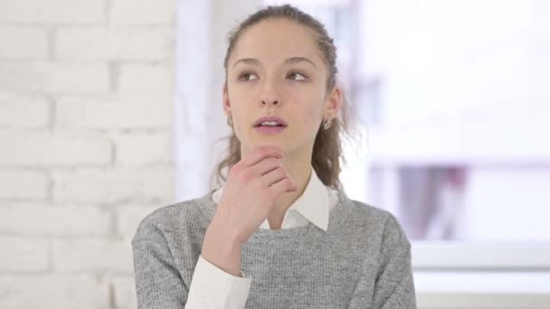 Portrait of Thoughtful Young Latin Woman Thinking in Office — Stock Video