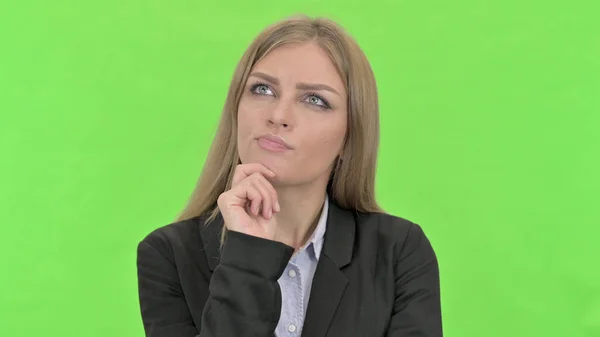 Ambitious Businesswoman Thinking about Something against Chroma Key — Stock Photo, Image