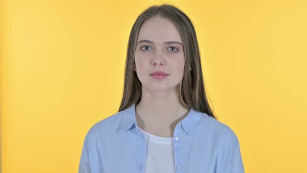 Sleepy Casual Young Woman Yawning , Yellow Background — Stock Video