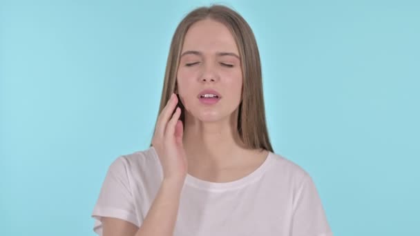 Portrait of Beautiful Young Woman having Toothache, Blue Background — Stok Video