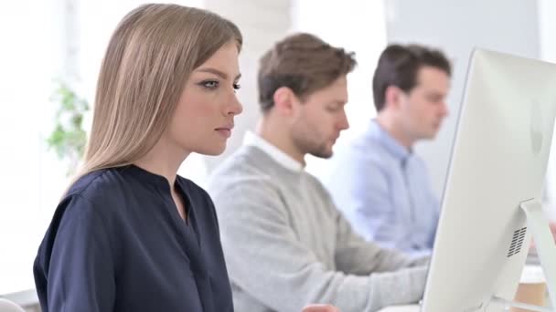 Creative Team using Laptop and Smiling at the Camera — Stock Video