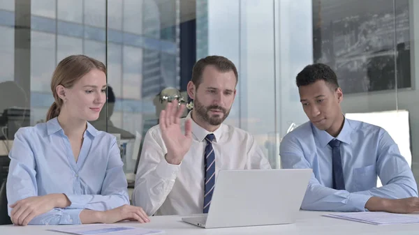 The Business people doing Video Chat on Laptop on Office Table — Stock Photo, Image