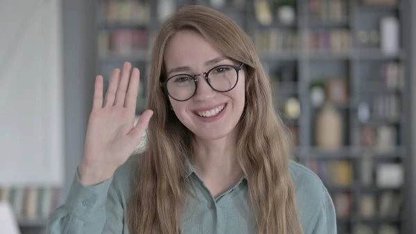 The Portrait of Young Woman Waving and Talking in Office — 스톡 사진