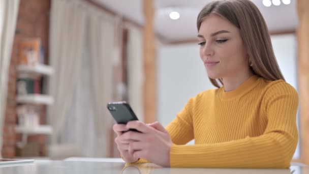 Cheerful Creative Young Woman using Smartphone — 비디오