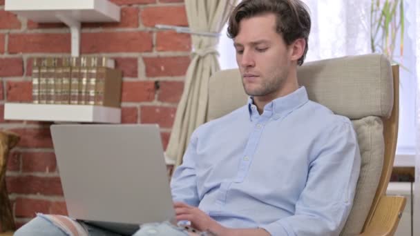 Ambitious Young Man using Laptop — Stock Video