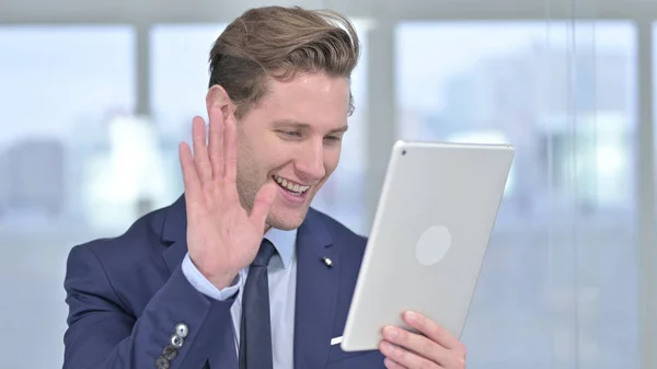 Portrait of Young Businessman doing Video Chat on Tablet — Stok Foto