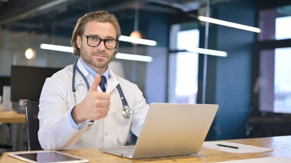 Confident Doctor Showing Thumbs Up at Work — Stock Photo, Image