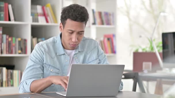 Young African American Man Standing up and, Leaving Workstation — Stok video