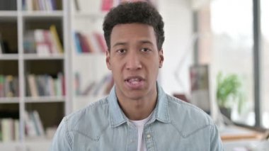 Yes, Young African American Man Shaking Head in Approval 