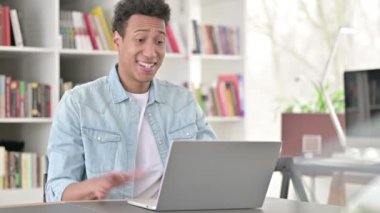 Online Video Chat on Laptop by Young African American Man 