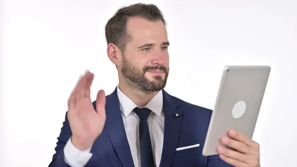 Portrait of Young Businessman doing Video Chat on Tablet, White Background — 图库照片