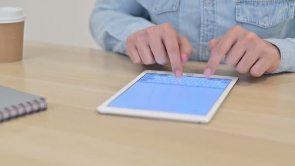 Close Up of Male Hands Typing on Tablet — Stock Video