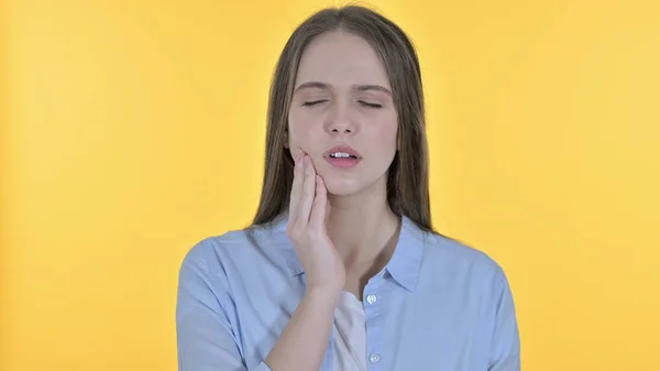 Sick Casual Young Woman having Toothache, Yellow Background — ストック写真